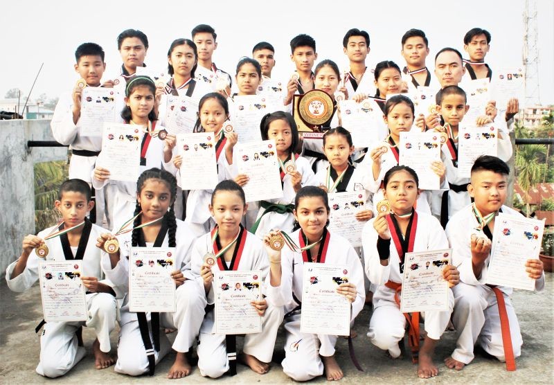 The Faith in Action Taekwondo team.
